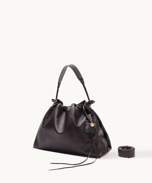 Songmont Luna Bag in Chocolate or Black — ~$250–$389 — product photograph
