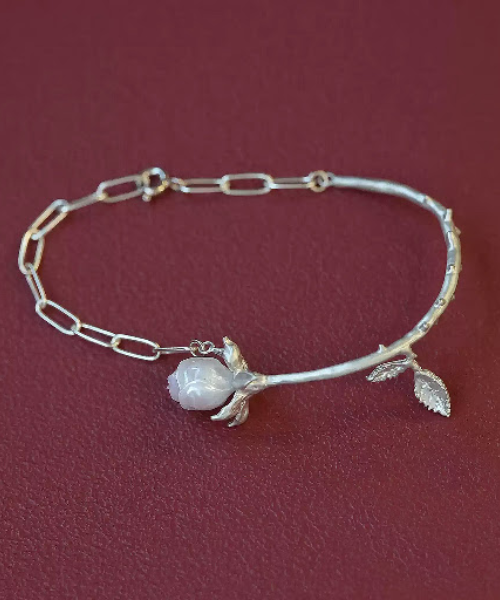 Hand-carved Freshwater Pearl Rose Branch Bracelet — ~$349 — product photograph